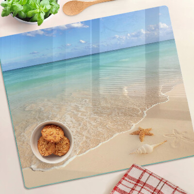 Deska kuchenna szklana Plaża z muszlami i falami