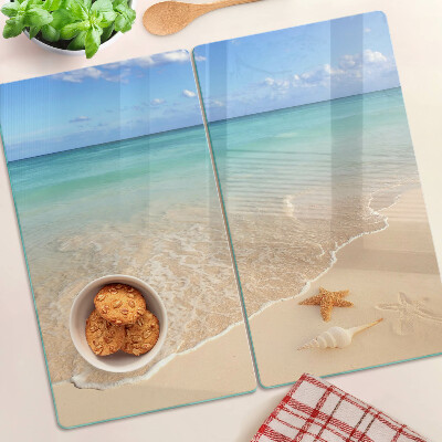 Deska kuchenna szklana Plaża z muszlami i falami