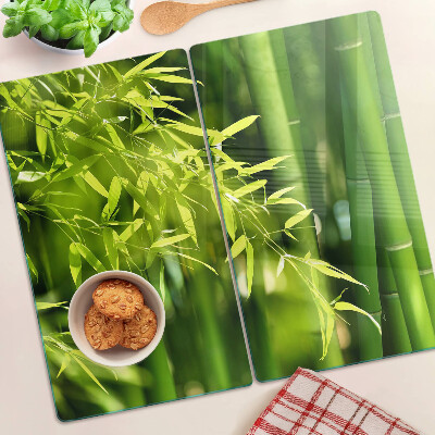 Szklana deska do krojenia Bamboo leaves and green foliage