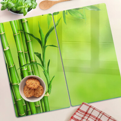 Szklana deska do krojenia Bamboo on a green background