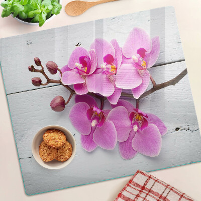 Szklana deska do krojenia Orchidee na białym tle