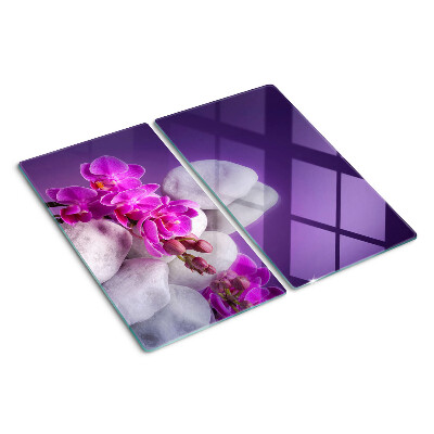 Deska kuchenna szklana Kwiaty orchidei na tle kamieni