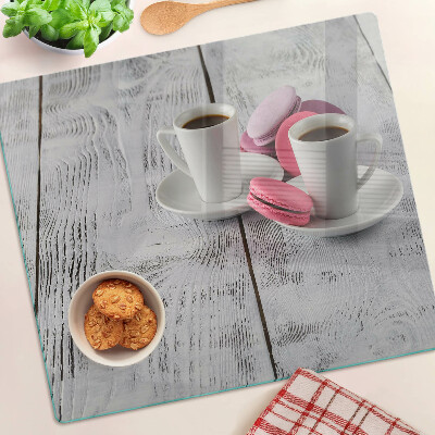 Szklana deska kuchenna Kawa i makaroniki na tle drewna