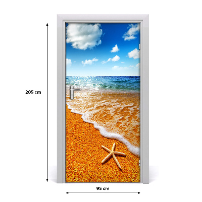 Naklejka DRZWI samoprzylepna Rozgwiazda na plaży