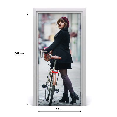Fototapeta samoprzylepna DRZWI Kobieta na rowerze