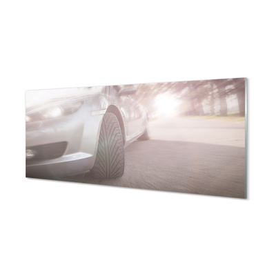 Obraz akrylowy Srebrne auto ulica drzewa