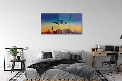 Obraz akrylowy Miasto chmury samolot zachód