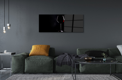 Obraz akrylowy Czarne tło kieliszek z winem