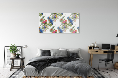 Obraz akrylowy Ptaki na gałęzi z kwiatami