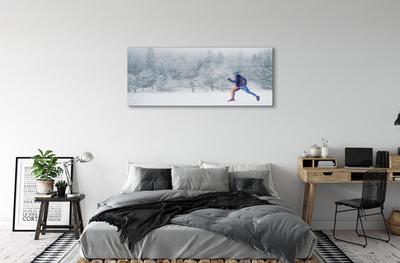 Obraz akrylowy Las zima śnieg człowiek
