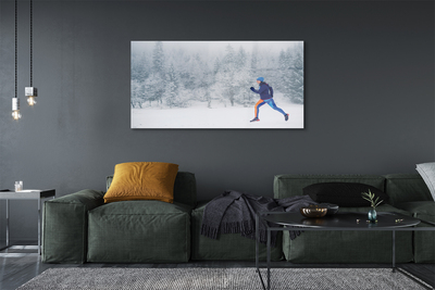 Obraz akrylowy Las zima śnieg człowiek