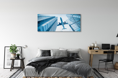 Obraz akrylowy Budynki samolot niebo