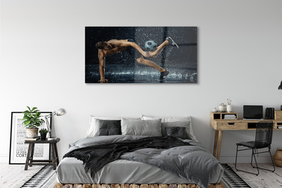 Obraz akrylowy Człowiek piłka deszcz