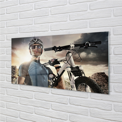 Obraz akrylowy Rowerzysta rower chmury