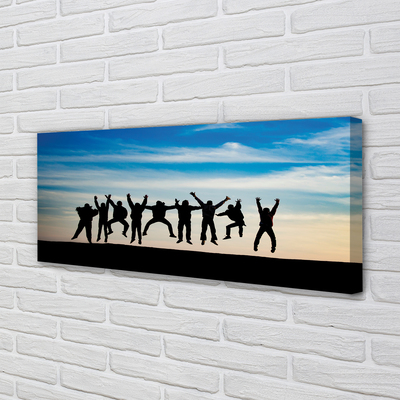 Zdjęcie na płótnie Ludzie pod Niebem z Chmurami