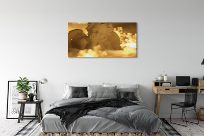 Fotoobraz na płótnie Leżący Anioł w Blasku Lampek