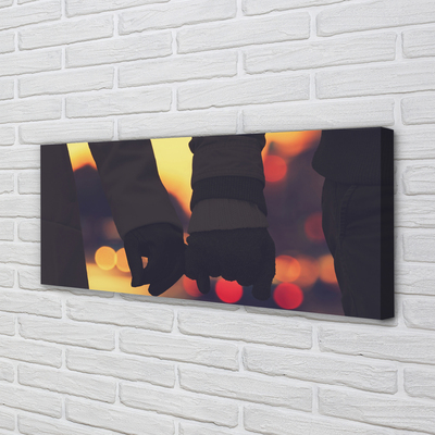 Zdjęcie na płótnie Dłonie w Blasku Świateł