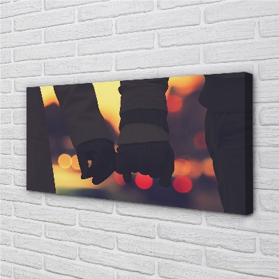 Zdjęcie na płótnie Dłonie w Blasku Świateł