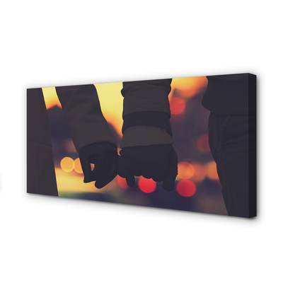 Zdjęcie na płótnie Dłonie w Blasku Świateł