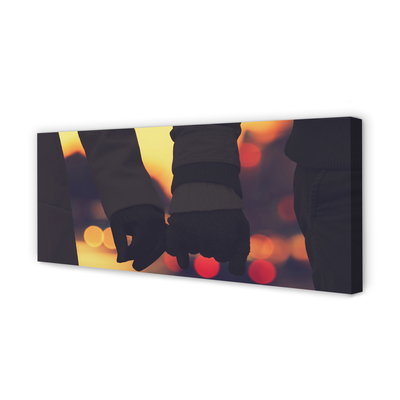 Zdjęcie na płótnie Dłonie w Blasku Świateł