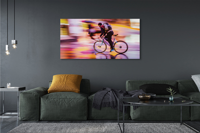 Obraz canvas na ścianę Rowerzysta w Blasku Świateł