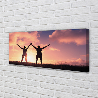 Fotoobraz na płótnie Ludzie o Zachodzie Słońca