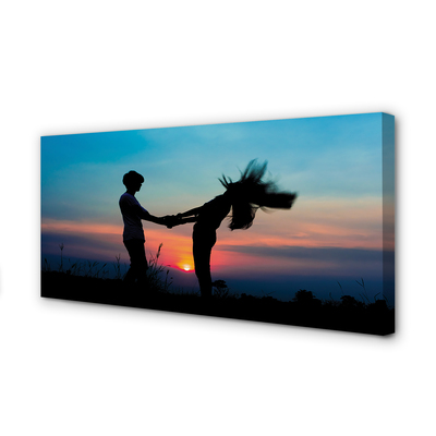 Fotoobraz na płótnie Ludzie na Tle Zachodu Nieba