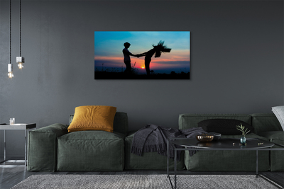 Fotoobraz na płótnie Ludzie na Tle Zachodu Nieba