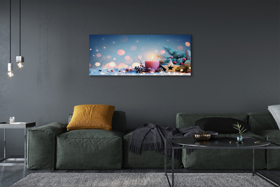 Obraz drukowany na płótnie Świeca i Śnieg w Świątecznej Scenerii