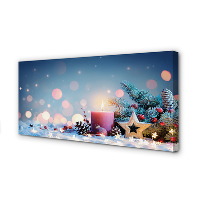 Obraz drukowany na płótnie Świeca i Śnieg w Świątecznej Scenerii