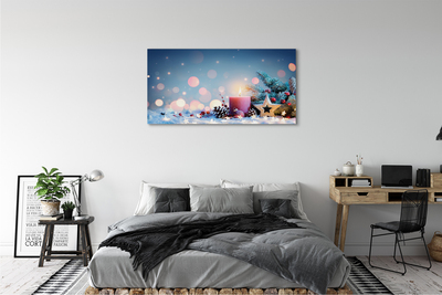 Obraz drukowany na płótnie Świeca i Śnieg w Świątecznej Scenerii