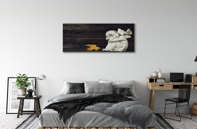 Duży obraz na płótnie Śpiący Anioł na Liściu i Deskach