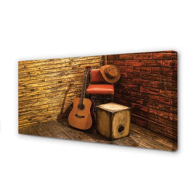 Obraz na płótnie Gitara kapelusz krzesło