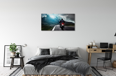 Obraz na płótnie Motocykl góry droga człowiek niebo