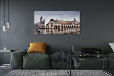 Zdjęcie na płótnie Deszczowy Kraków: Sukiennice i Kościół