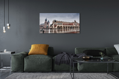 Zdjęcie na płótnie Deszczowy Kraków: Sukiennice i Kościół