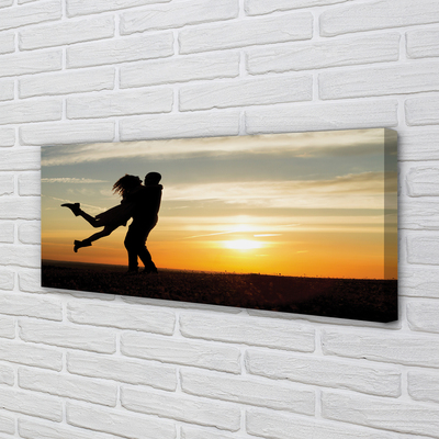 Duży obraz na płótnie Ludzie i Chmury o Zachodzie