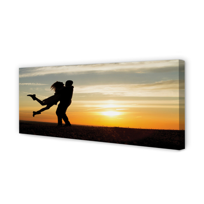 Duży obraz na płótnie Ludzie i Chmury o Zachodzie