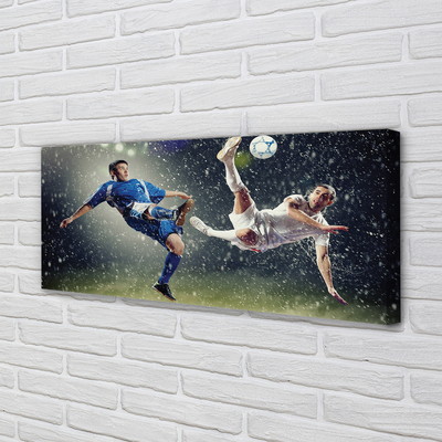 Obraz drukowany na płótnie Futbol W Strugach Deszczu
