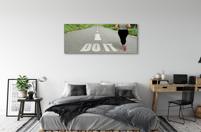 Obraz canvas na ścianę Kobieta Biegnąca Drogą