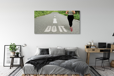 Obraz canvas na ścianę Kobieta Biegnąca Drogą