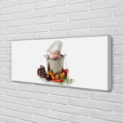 Obraz drukowany na płótnie Dziecko bawiące się w Kuchni