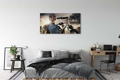 Obraz na płótnie Rowerzysta rower chmury