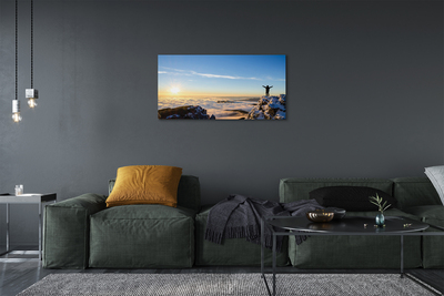 Obraz canvas na ścianę Człowiek w Górach o Wschodzie