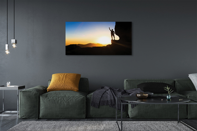 Obraz drukowany na płótnie Człowiek w Górach o Zachodzie