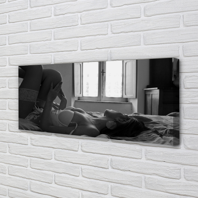 Obraz na płótnie Leżąca kobieta patrząca na okno