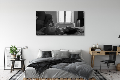 Fotoobraz na płótnie Kobieta przy Oknie