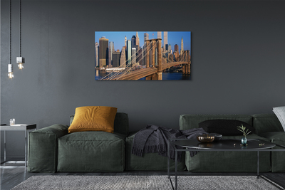 Obraz drukowany na płótnie Rzeka w Cieniu Wieżowców i Mostu