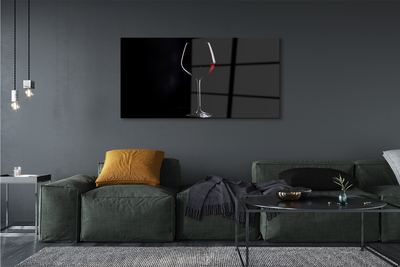 Obraz na szkle Czarne tło kieliszek z winem
