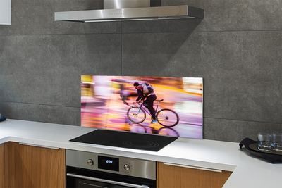 Szklany Panel Człowiek i Rower w Blasku Świateł